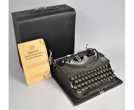 A Vintage Good Companion Manual Typewriter with Instruction Booklet 