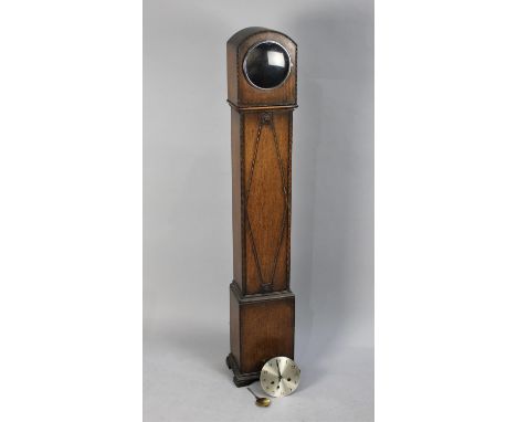 An Edwardian Oak Grandmother Clock, Movement Detached but Present 