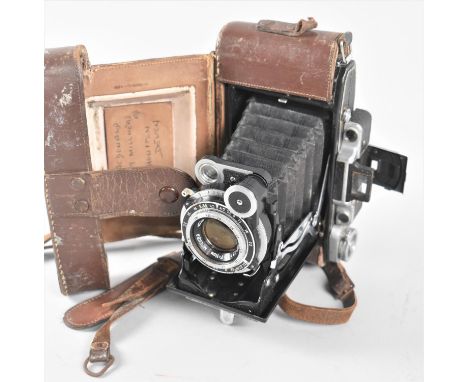 A Vintage Russian Folding Camera, KMZ Moscva 1 