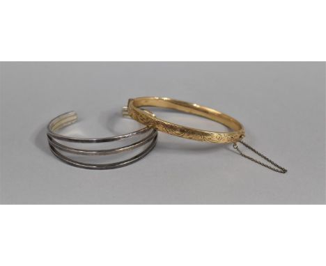 A Silver Bangle together with a Gilt Metal Bracelet 