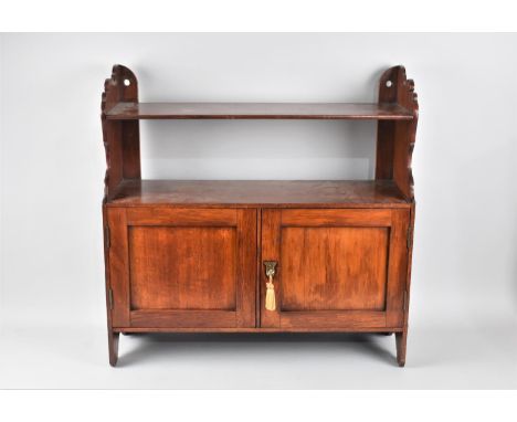 An Edwardian Mahogany Wall Hanging Shelf Unit, 58.5cms Wide 