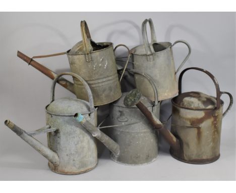 A Collection of Five Various Vintage Galvanized Watering Cans 