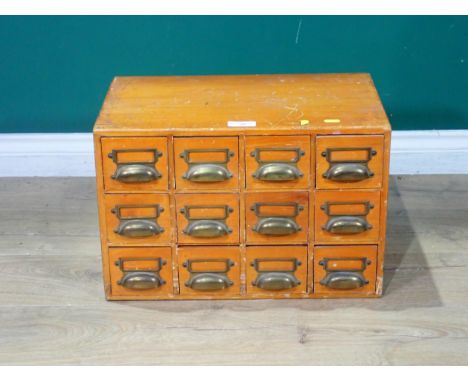 A Cabinet fitted with twelve drawers containing a collection of approximately 530 glass Photographic Slides of mainly First W