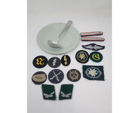 A lot of cloth Badges to include Luftwaffe Shoulder Boards and Collar Badges, Army Badges including mountain troops and a Luf