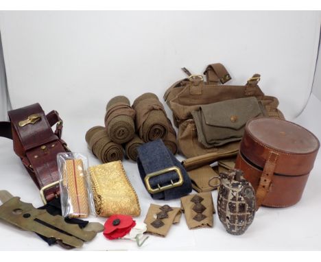 A box of military items including deactivated Hand Grenade, Officer's Stove in leather case, Sam Brown, etc. 