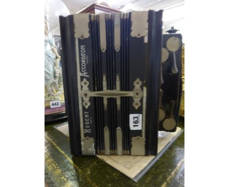 A Regent ebonised nineteen button accordion, together with an associated pamphlet 