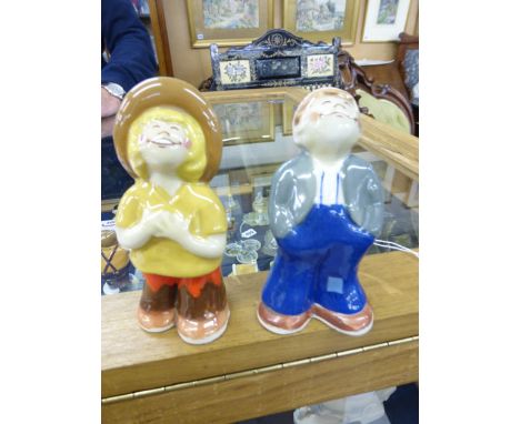 A pair of Wade 'Bisto Kid' cruets