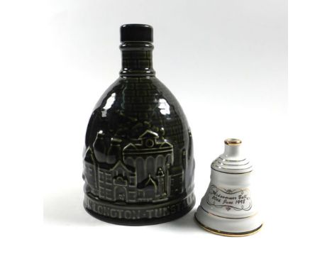 A Wade 'Potteries' decanter, h. 19.5 cm, together with a Wade 'United Distillers' miniature decanter in the form of a bell