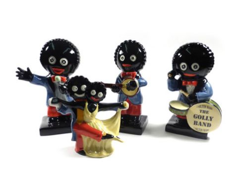 Four Carlton Ware limited edition figures each modelled as a golly band figure, max h. 19 cm, together with a limited edition