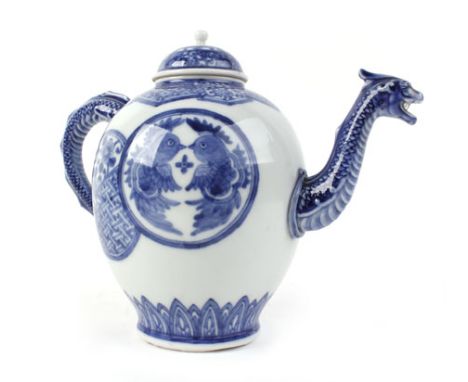 A late 19th/early 20th century Chinese blue and white teapot and cover of ovoid form, the handle and spout formed as a stylis
