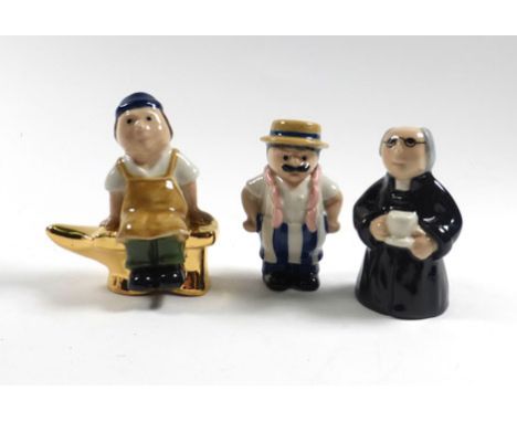 Five Wade Whimsey on Why figures, each boxed