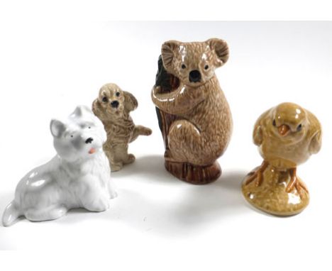 Five Wade Collector's Fair figures consisting;grey haired rabbit,koala,chick and two puppies, max h. 11 cm