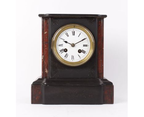 A late 19th century mantle clock, the enamelled face with Roman numerals within a marble and slate based case, h. 23 cm CONDI