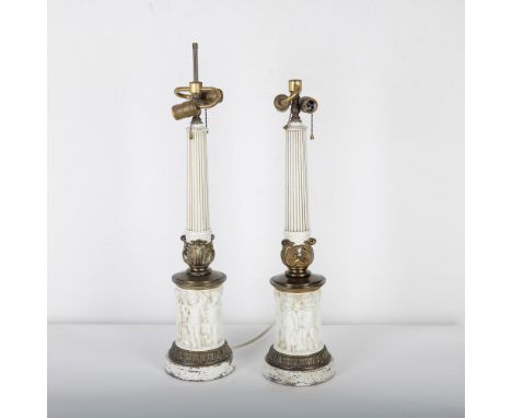 A striking pair of neoclassical-style table lamps, featuring fluted column shafts in an off-white finish with bronze-toned me