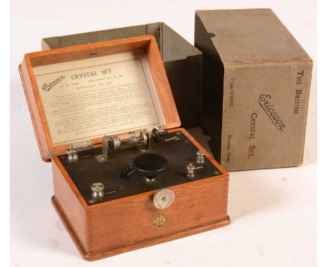 An Ericcson Crystal Set type 0/1002, in light oak case lithographed 'Ericcson Beeston, Notts',and 'BBC Type approved by postm