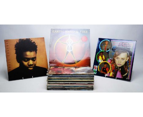 A collection of mixed LPs and 12" singles, mostly 70s and 80s pop, artists to include: Tracy Chapman; Sade; Spandau Ballet; M