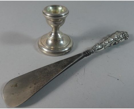 A Small Silver Candle Stick, Birmingham 1970 and a Silver Handled Shoehorn Birmingham 1906 