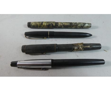 A Collection of Four Vintage Fountain Pens, One with Gold Nib 
