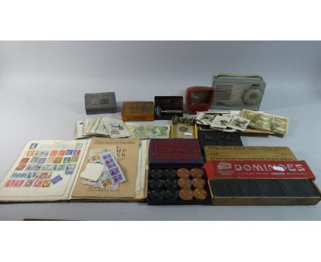 A Tray of Curios to Include Cow and Gate Playing Cards, Railway Brand Dominoes, Vintage Radio, Four £1 Notes, Stamp Album and