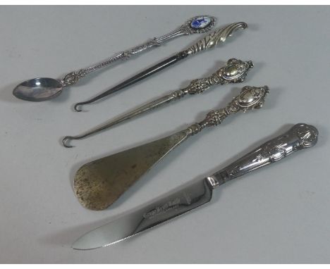 A Collection of Silver Handled Shoe Horns, Letter Openers, Button Hooks Together with a Dutch Long Handled Spoon Stamped 90 