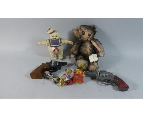 A Collection of Vintage Toys to Include Corgi, Magic Roundabout, Tom and Jerry, Ghostbusters and Merrythought Teddy 