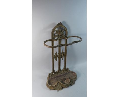 A Cast Metal Stick Stand with Removable Drip Tray 