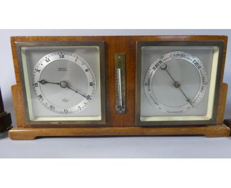 A Mid 20th Century Elliot Weather Station with Clock, Barometer and Thermometer Inscribed Robinson's Shrewsbury, 29cm Wide 