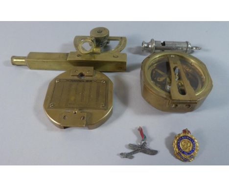 A Collection of Militaria Ephemera to Include Reproduction Brass Compass, Brass Inclinometer, ARP Whistle, Enamel Badges and 