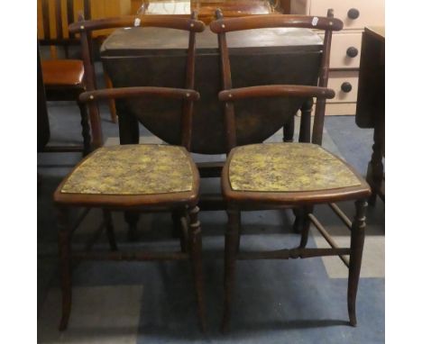 An Edwardian Oak Drop Leaf Gate Legged Table for Restoration Together with Two Bedroom Chairs 