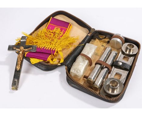 Travel communion set, consisiting of crucifix, two candlesticks, base and sash, housed in a leatherette case