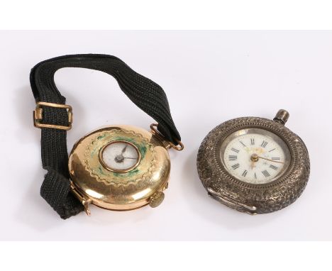 Gold coloured metal half hunter style wristwatch, the outer case stamped .525 and with central circular glass panel the white