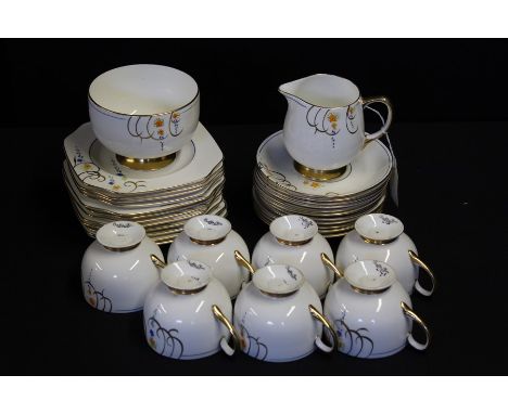 Carlton china part tea service, decorated with gilt scrolls and floral sprays, consisting of seven teacups, eleven saucers, t