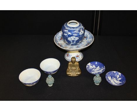 Porcelain tazza, two snuff bottles, brass Buddha, two blue and white tea bowls and saucers, ginger jar (9)