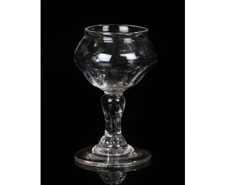 18th Century glass, possibly a lamp base, the panelled bowl above a twisted stem. 