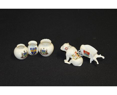 Crested china, to include Carlton model of Bill Sykes dog, Gemma wheelbarrow, two Carlton pots, Goss pot (5)