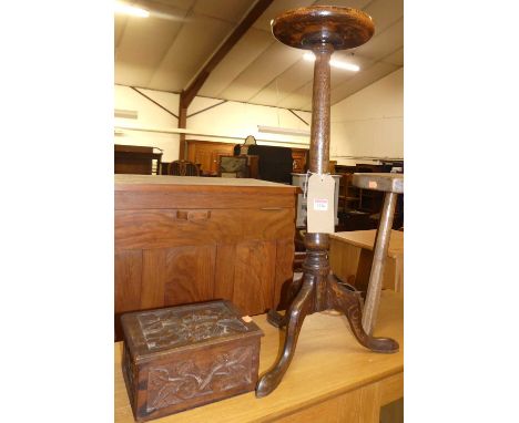 An oak pedestal wine table; together with a rustic octagonal topped milking stool; and a relief carved hinge topped table box