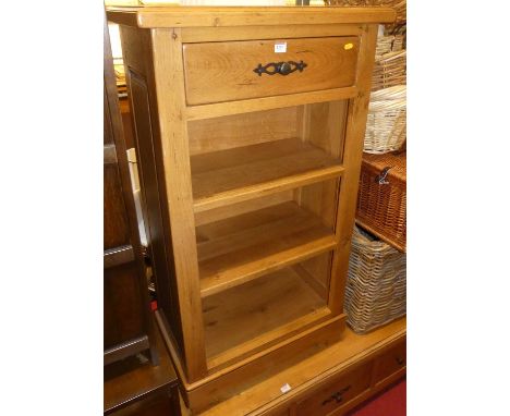 A contemporary joined light oak open bookshelf, having single upper drawer, w.66.5cm 