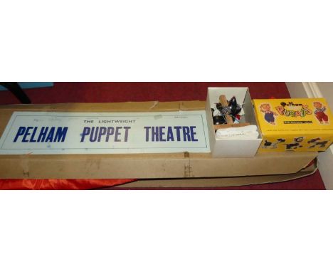 A boxed lightweight Pelham Puppet theatre housed in the original packaging together with a boxed cat standard puppet