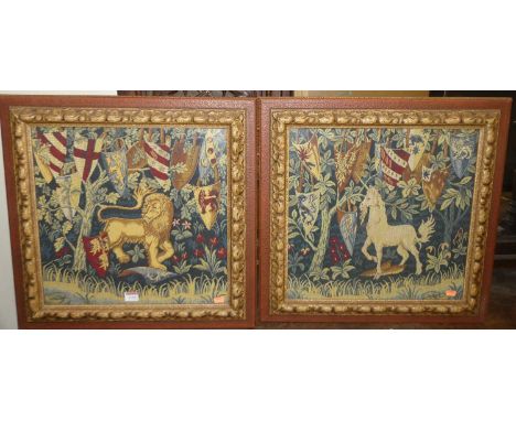 A pair of contemporary tapestry framed wall hangings in the heraldic taste; together with a tapestry inset and brass framed f