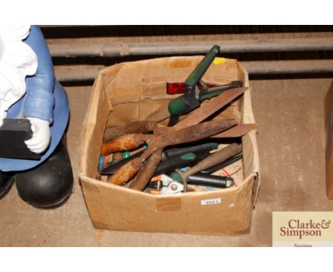 A box containing various hand tools