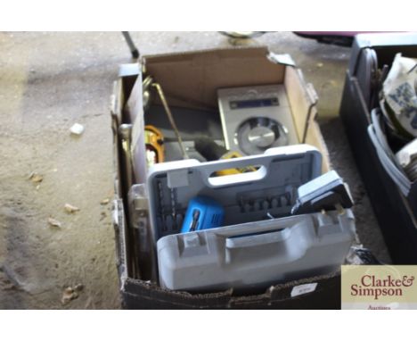A box of various tools including a Tool King cordless drill etc.