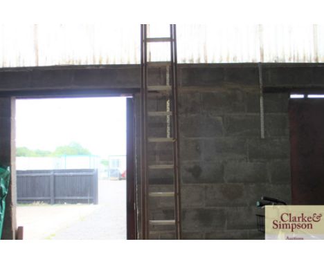 A wooden and aluminium extending ladder