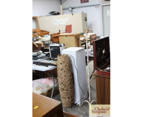 A floor standing lamp together with a wrought iron painted standard lamp