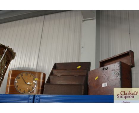 A stationery rack; a box and an Art Deco mantel clock