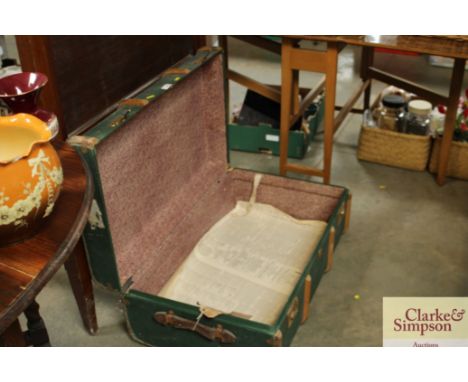A wooden bound travelling trunk