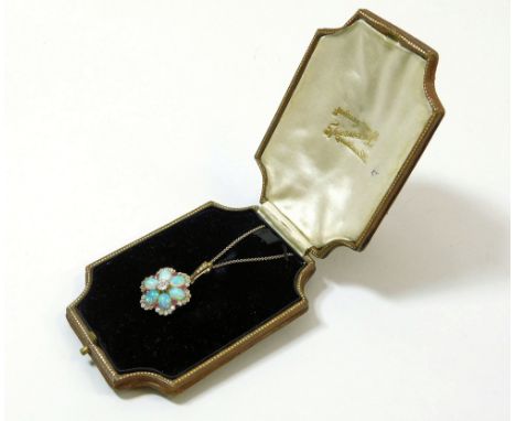 OPAL &amp; DIAMOND PENDANT. An Edwardian 15ct. gold pendant/brooch, comprising six colour &amp; quality-matched cabouchon opa