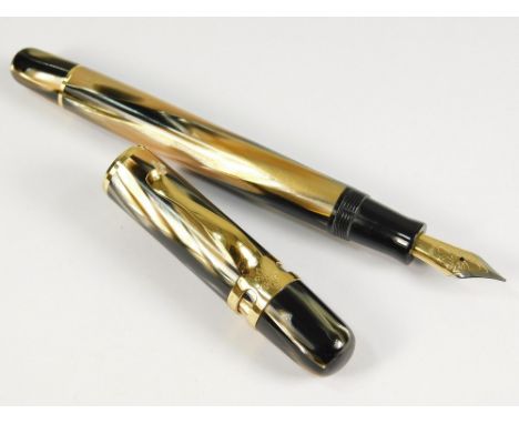 VISCONTI. A Visconti Cinnabar Ragtime LE fountain pen. White &amp; yellow metal Visconti nib. A pearly peach celluloid piston