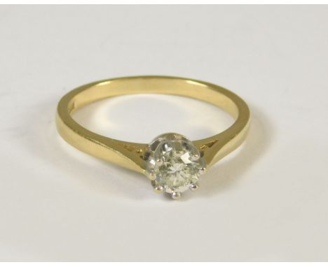 DIAMOND RING. An 18ct. gold solitaire diamond ring, the claw set stone of approx. 0.35ct. spread. Size P.