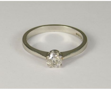 DIAMOND RING. A platinum solitaire diamond ring, the stone of approx. 0.40ct. spread. Size P. Approx. 4g.