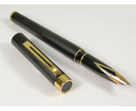 SHEAFFER. A Sheaffer Targa 1003 fountain pen. 14ct. gold Sheaffer USA nib. A 1990's matte black metal pen with bladder filler